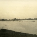 19057